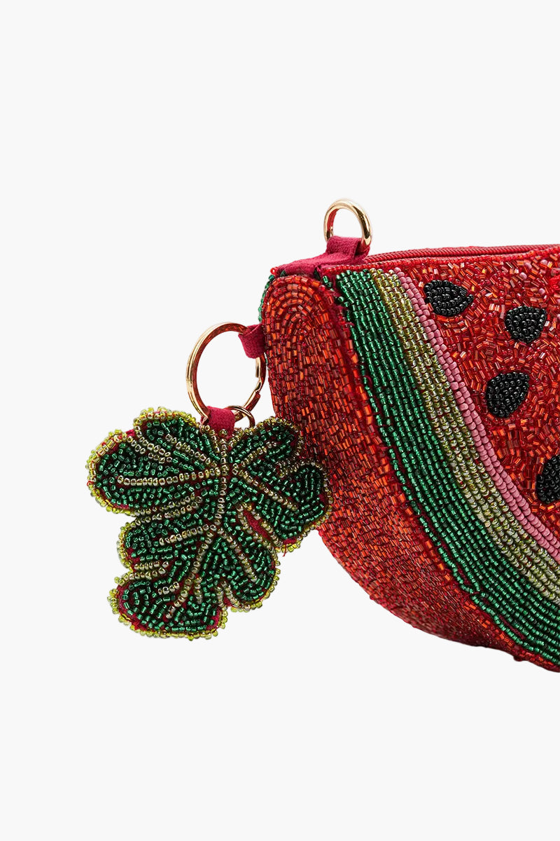 Beaded watermelon-shaped coin purse with a matching keychain on a white background