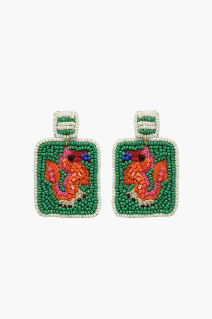 Pair of beaded earrings with a fox design on a white background