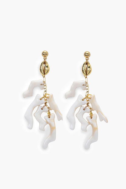 Pair of white coral-like earrings with gold accents on a white background