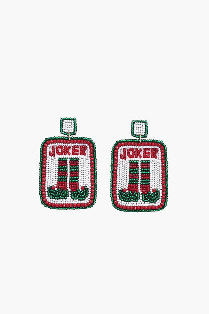 Pair of earrings with 'Joker' design on a white background